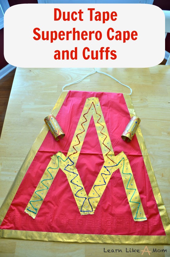 Duct Tape Superhero Cape and Cuffs - Learn Like A Mom! http://learnlikeamom.com/creative-corner/diy/duct-tape-superhero-cape-cuffs/ This is so easy for any costume or just for a day of play!